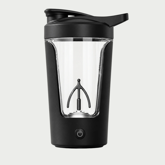 Batidor eléctrico Shako negro de 400 ml sobre fondo neutro, con el vaso transparente, la hélice de tres brazos y el botón de encendido